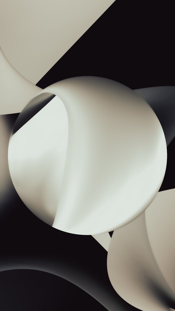 Artistic abstract design with overlapping circular shapes and soft gradients.